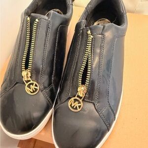 Michael Kors Black Leather Slip-On Sneakers with Gold Zipper Accents
